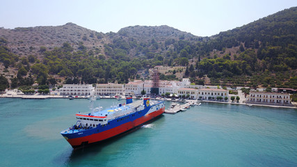 Aerial bird's eye view photo taken by drone of bay and iconic Monastery of Panormitis, Symi island, Dodecanese, Greece