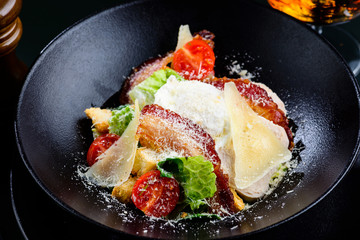 Delicious Ceasar salad with tomatoes