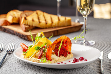 The concept of high European cuisine, molecular cuisine. Dish in an expensive restaurant of...