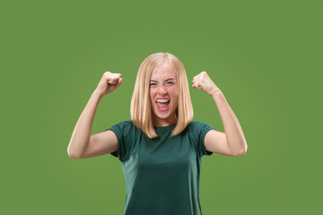 Winning success woman happy ecstatic celebrating being a winner. Dynamic energetic image of female...