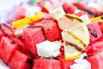 salad with watermelon, feta cheese, lemon and balsamic sauce