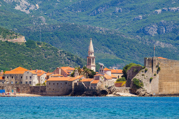 View on the old city Budva at Adriatic sea coastline, Montenegro. summer seascape background