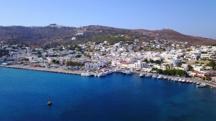 Fototapeta na wymiar Aerial birds eye view photo taken by drone of picturesque port of Patmos island called Skala, Dodecanese, Greece