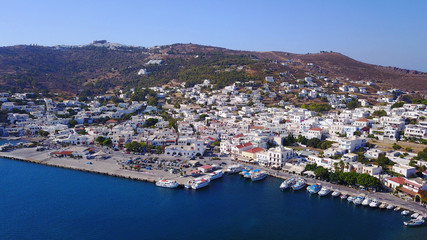 Naklejka premium Aerial birds eye view photo taken by drone of picturesque port of Patmos island called Skala, Dodecanese, Greece