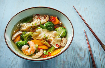 Spicy wonton soup with chili and dumplings