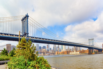 New York view of the Lower Manhattan and the Manhattan Bridge across the East River.