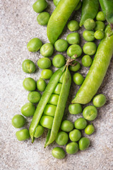 Fresh green peas and pods