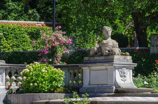 MASSANDRA, CRIMEA - June, 2018: Sculpture of a woman-sphinx with a ball at the Southern facade of Massandra Palace