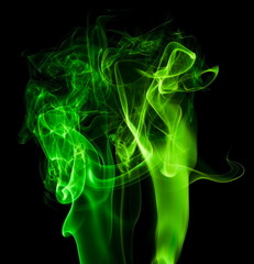 Green smoke on black background