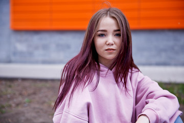 Obraz premium Merry girl in a pink sweatshirt. mockup.