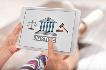 Justice concept on a tablet