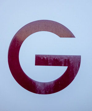 Written Wording in Distressed State Typography Found Letter G