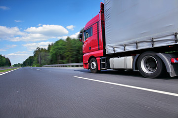 A fast truck running on the highway