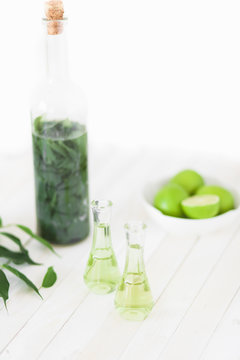 Herbal brandy with healty leafs and lime