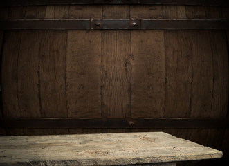 background of barrel and worn old table of wood