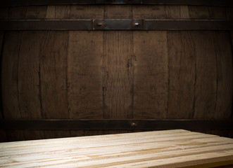 background of barrel and worn old table of wood