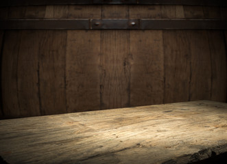 background of barrel and worn old table of wood
