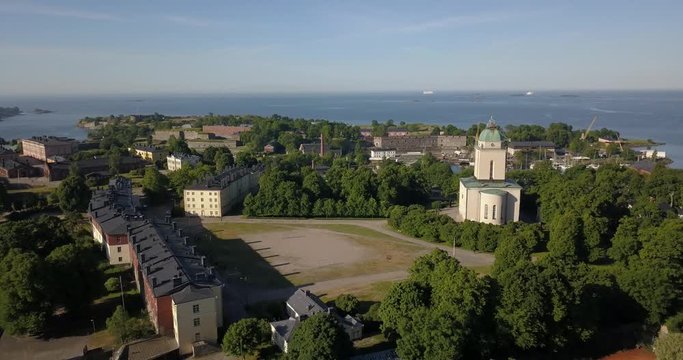 4K high quality summer morning aerial video of Helsinki Baltic Sea Finnish Bay lagoon area, sea skyline, Suomenlinna Island with forts and cannons near the capital of Finland Suomi, northern Europe