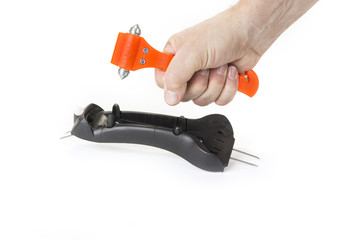 Safe hammer in the car on the white