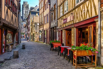 Foto op Canvas Cozy street with timber framing houses and tables of restaurant in Rouen, Normandy, France © Ekaterina Belova