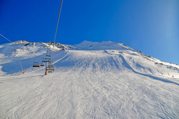 Ski lift at popular ski resort in Austrian alps.