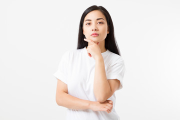 Thinking Young asian girl isolated on white background. Copy space. Mock up. Summer woman clothes blank template white t shirt.