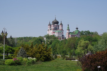Fototapeta na wymiar old monastery and green park