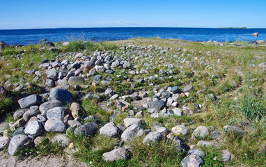 Fototapeta na wymiar The Solovki, ancient stone labyrinths against the White Sea