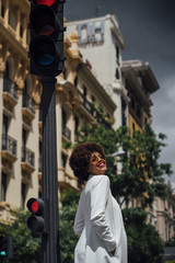 Beautiful girl for afro in the streets of Madrid Spain.