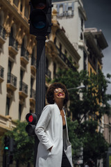 Beautiful girl for afro in the streets of Madrid Spain.