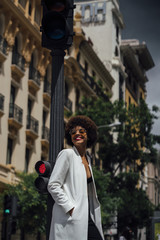 Beautiful girl for afro in the streets of Madrid Spain.