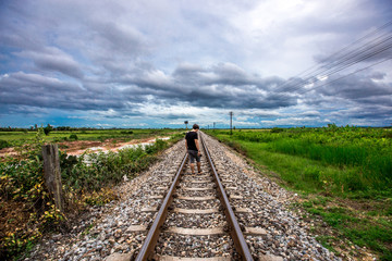 Fototapeta premium Railroads have barricades and traffic signals to alert when trains pass.