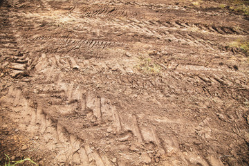 Traces of large wheels on the ground
