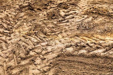 Traces of large wheels on the ground
