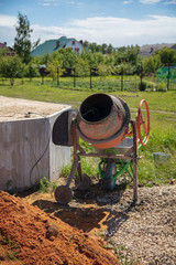 Concrete mixer is at the construction site