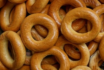 brown texture of small round bagels in a heap