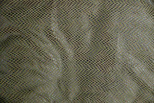 green black spotted skin texture on clothes
