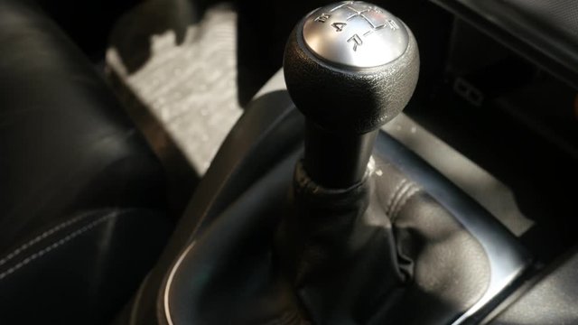 Changing gears manually with car shift stick 4K video