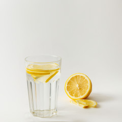 Fresh fresh water with lemon on a white background