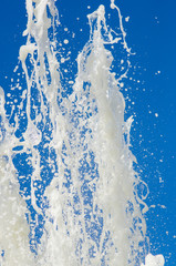 Fountain in city park on hot summer day