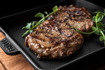 Meat steak on the wooden board