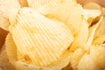 Potato chips background, close-up.