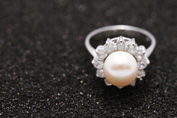 Pearl on diamond ring