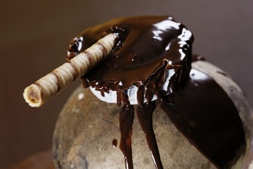 Chocolate souffle with wafer. Dessert is a confectionery course that concludes an evening meal. The course usually consists of sweet foods.