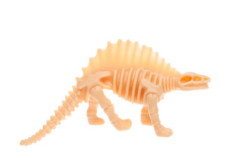Toy dinosaur on white isolated background