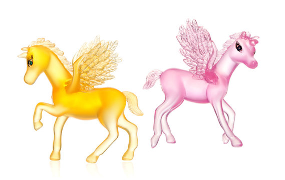 Toy unicorns on a white background isolated