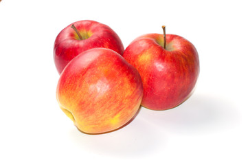 Apples ripe red with shadow isolated on white background