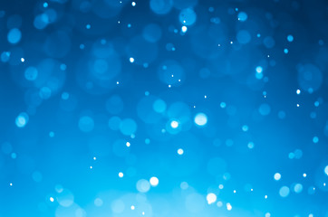Dark blue abstract backgrounds with bokeh.