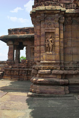 Exterior view of the northern walls. The Devakoshthas, Virupaksha temple, Pattadakal temple complex, Pattadakal, Karnataka. Northwest view. Northern mukha-mandapa is also seen.