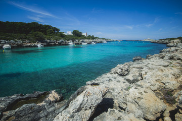 Fototapeta na wymiar turquoise water in Spanish Menorca like in Caribbean, clear and perfect for swimming and bathing